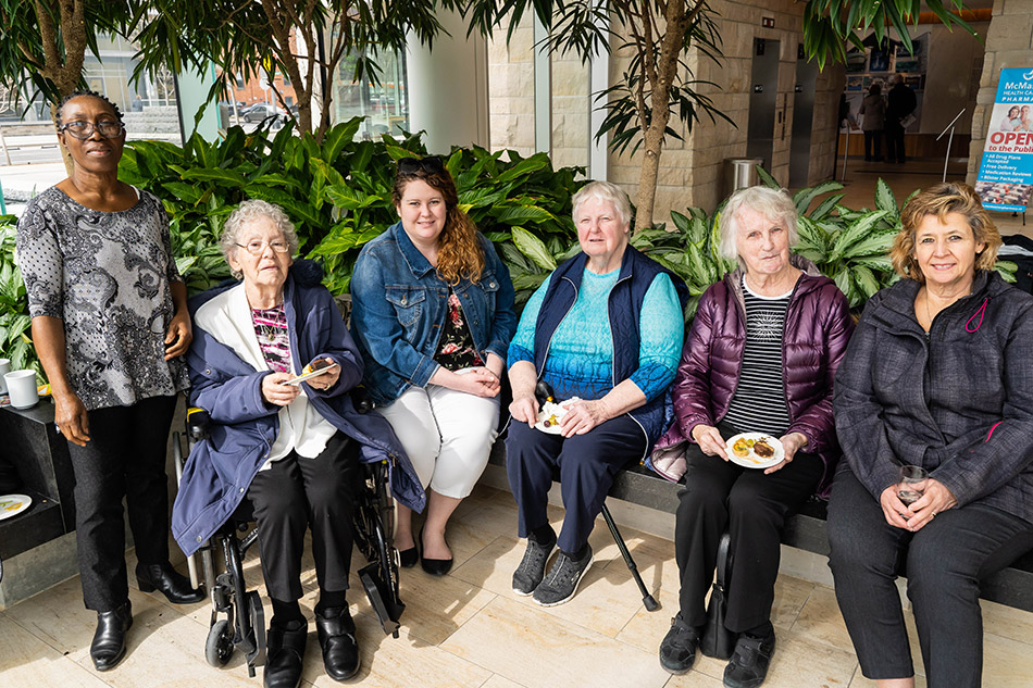 Artful Moments participants attending the exhibition opening reception with family and friends