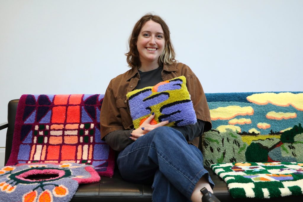 Julianna Biernacki surrounded by her creations